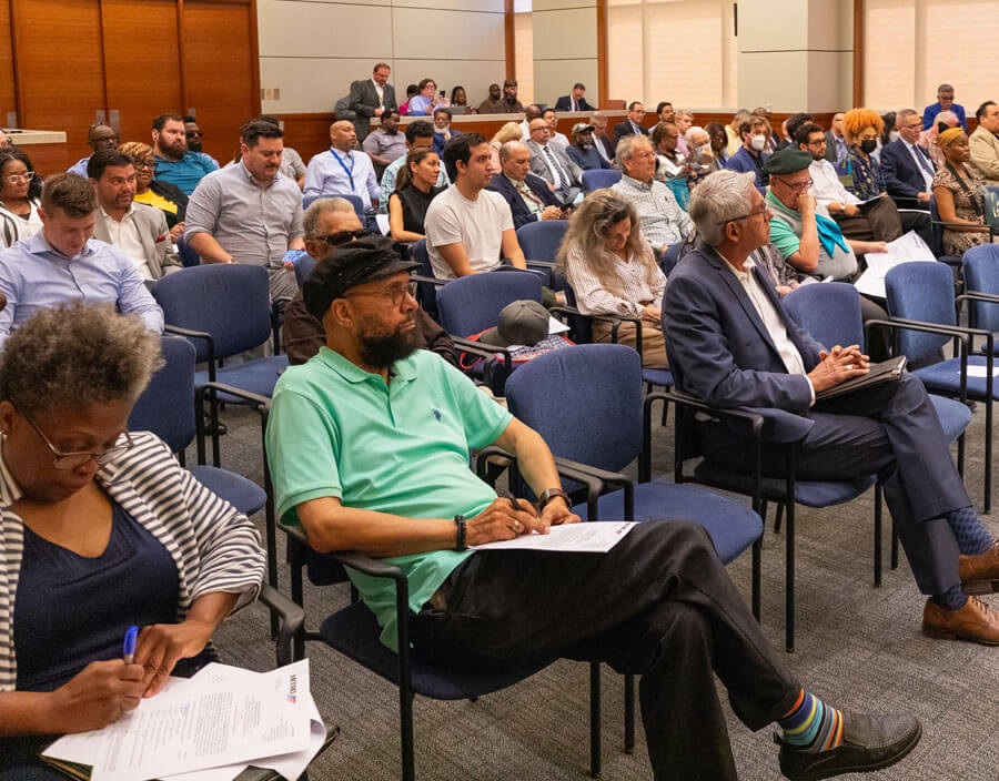 Attendees seated in METRO Boardroom at 1900 Main Street in Houston.